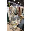 Image 2 : MOBILE CLOTHING RACK WITH ASSORTED SET DEC WARDROBE- ASSORTED PLACEMATS AND BABY BLANKETS