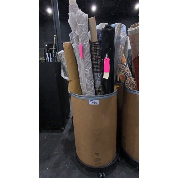 CARDBOARD BARREL OF ASSORTED LARGE FABRIC ROLLS *ROLLING PEDESTAL NOT INCLUDED*