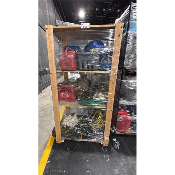 MOBILE WOODEN SHELVING UNIT WITH ASSORTED SHOP CONTENTS- GAS CANS, HOSE, WIRE, SHOP LIGHTS & MORE