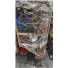 Image 4 : MOBILE WOOD SHELVING UNIT WITH ASSORTED HOSE, LIFTING STRAPS, WELDING LINE, TOOL CADDYS, WOODEN