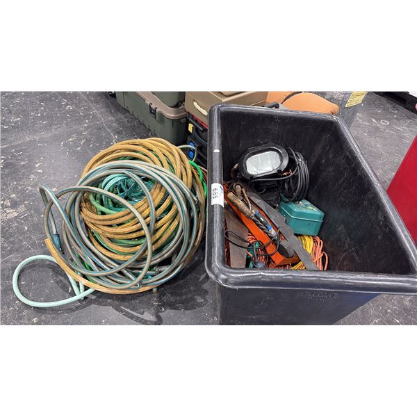 CONTENTS OF BIN- ASSORTED TOOLS, FLASHLIGHT, EXTENSION CORDS & LARGE ASSORTMENT OF GARDEN HOSE