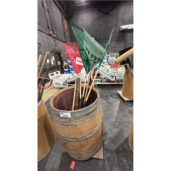 WOODEN BARREL WITH ASSORTED RAKES