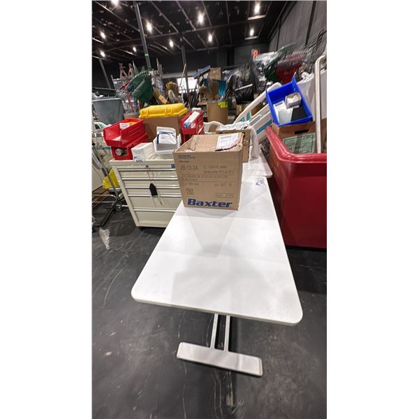 2 ROLLING TABLES, BOX OF DISPOSABLE BIOHAZARD GEAR AND BOX OF IV BAGS