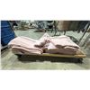 Image 2 : ROLLING GARMENT RACK WITH PINK HOSPITAL BLANKETS