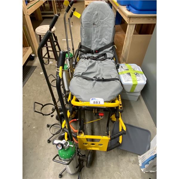 ROLLING PARAMEDICS BED WITH 5 OXYGEN CARTS