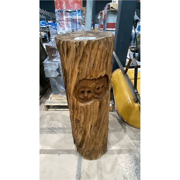 CARVED TREE STUMP WITH OWL FACES