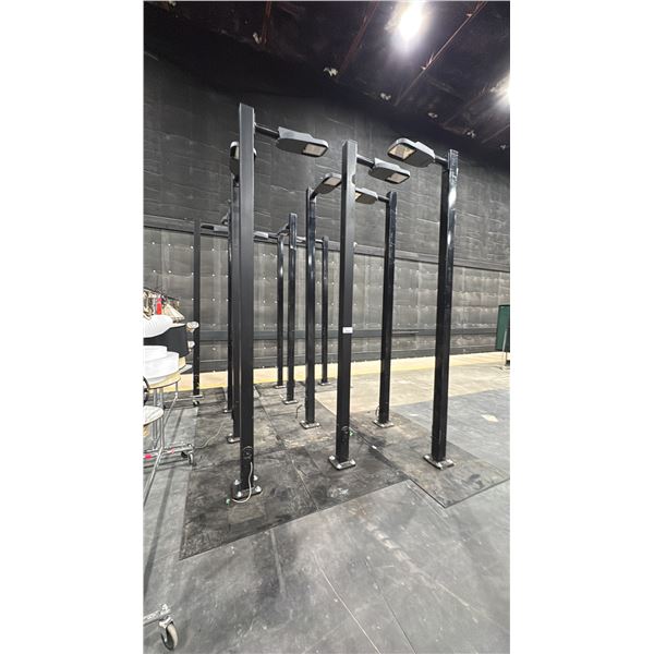 GROUP OF 11 METAL LED PROP LIGHT POSTS
