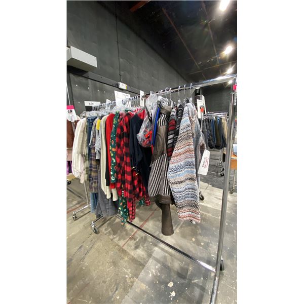 LARGE GROUP OF ASSORTED PRODUCTION COSTUME ITEMS- SWEATERS, PAJAMAS, BUTTON UP SHIRTS, JEANS