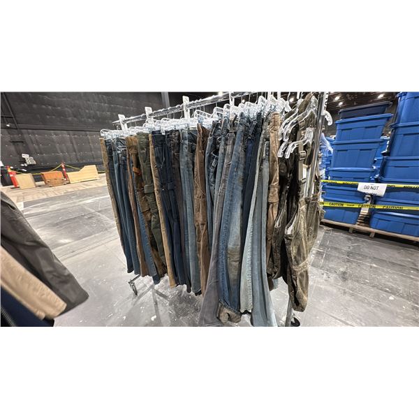 LARGE GROUP OF ASSORTED PRODUCTION COSTUME ITEMS- CARGO PANTS, JEANS, OVERALLS *RACK NOT INCLUDED*