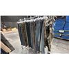 Image 1 : LARGE GROUP OF ASSORTED PRODUCTION COSTUME ITEMS- CARGO PANTS, JEANS, OVERALLS *RACK NOT INCLUDED*