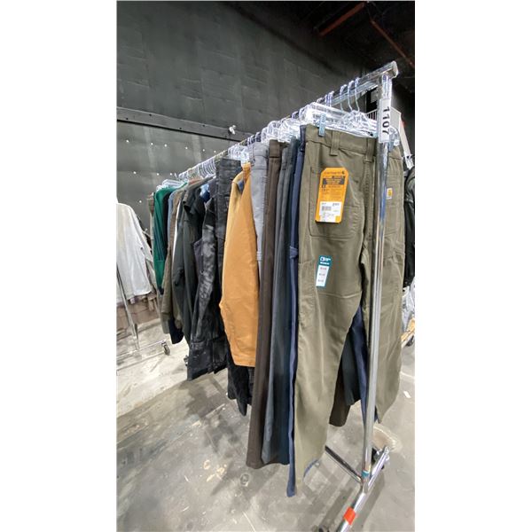 LARGE GROUP OF ASSORTED PRODUCTION COSTUME ITEMS- WORK PANTS, SWEATERS, VESTS, DRESS PANTS