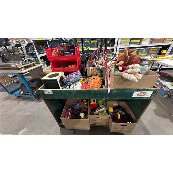 GREEN SHELVING UNIT WITH ASSORTED VINTAGE TOYS