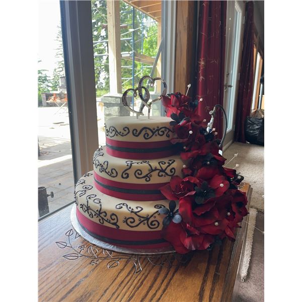 Three-Tier Wedding Cake with Red Floral Décor