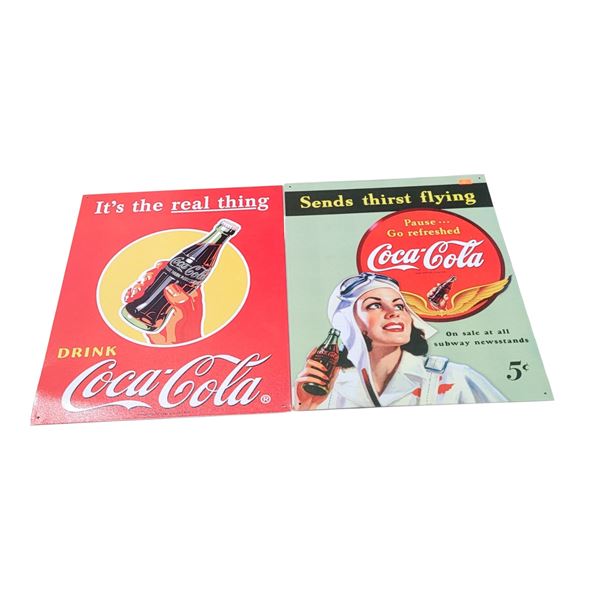 2 Coca-Cola Advertising Signs