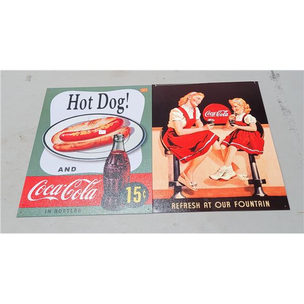 2 Coca-Cola Advertising Signs