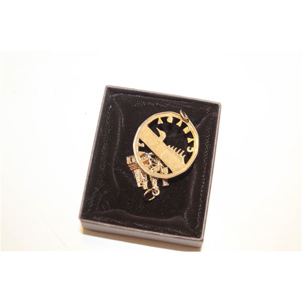 CARVED LOONIE+STERLING OIL DERICK PENDANTS