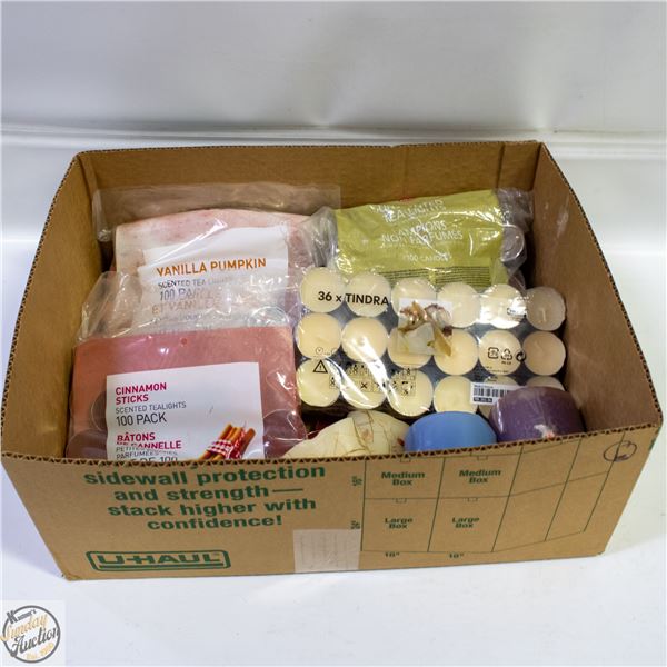 FLAT WITH LOTS OF SCENTED VOTIVE CANDLES -