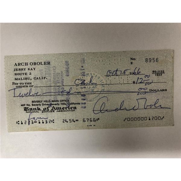 House on Fire first edition and personal check