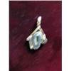 Image 2 : 21. Sterling Silver Pendant with freeform Opal and blue topaz.