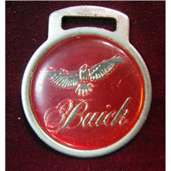 683. "Buick" Watch fob. Red & Gold.