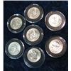 Image 2 : 778. (7) 1960 D Washington Quarters all in airtight holders.