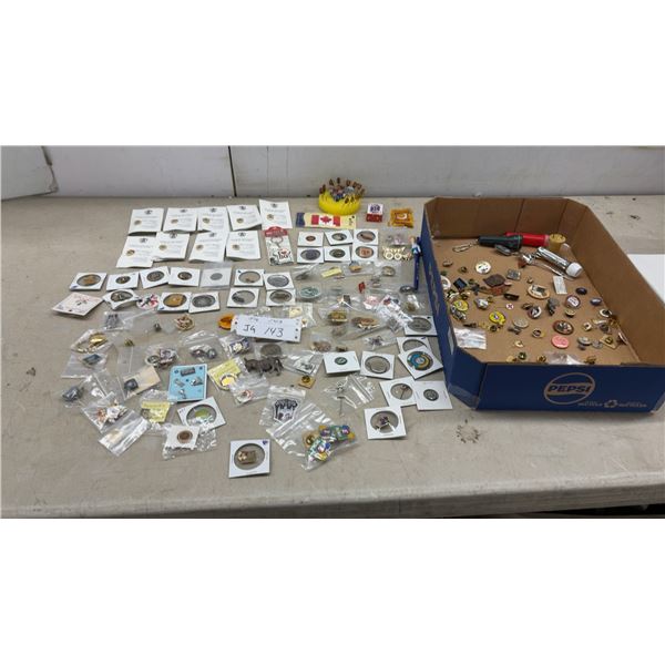 Assorted Collectible Pins, Commemorative Coins, Keychains, and More