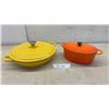 Image 1 : Le Creuset Enameled Cast Iron Dutch Ovens, Yellow Round and Orange Oval, Set of Two