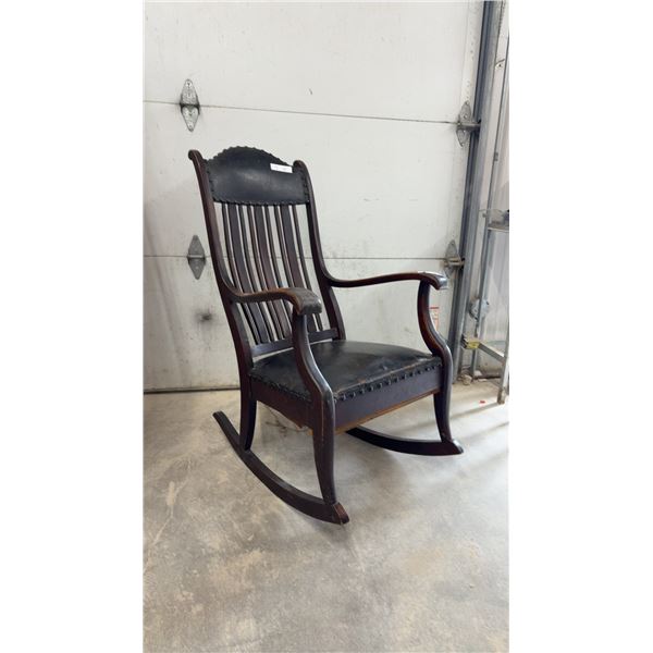 Antique Slatted Back Wooden Rocking Chair with Black Leather Upholstery and Tack Trim