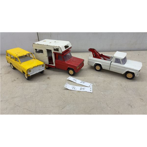 Nylint Pressed Steel 1960s Jeep Wagoneer, Gladiator Camper, and Gladiator Tow Truck