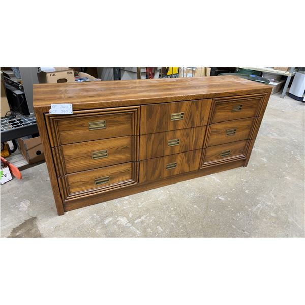 Oak Nine-Drawer Dresser with Brass Campaign-Style Hardware 65-1/2 x 18 x 29
