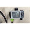 Image 3 : Melnor 2-Zone Digital Water Timer, Orbit B-Hyve Timer, and Black Irrigation Hose