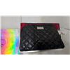 Image 2 : This Is a Black Steve Madden Quilted Travel Case with a Faux Snakeskin Texture, Identified by the S
