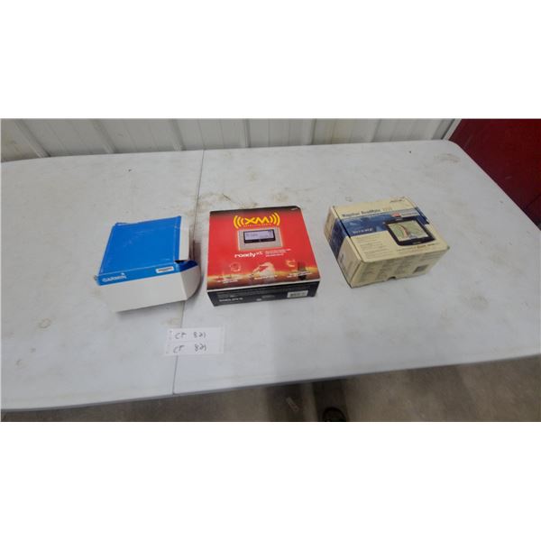 Garmin GPS, Delphi Roady XT XM Satellite Radio, and Magellan RoadMate 1212 GPS