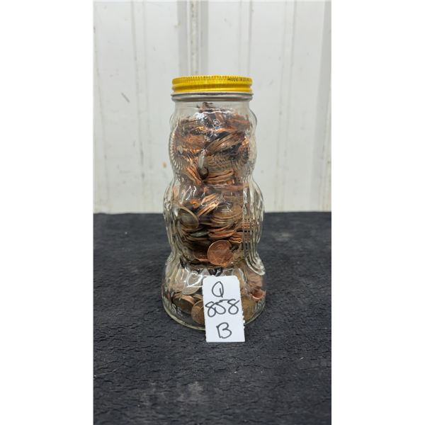 Old Glass Coin Bank Filled with Pennies