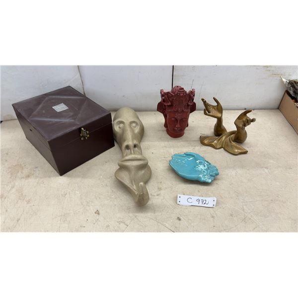 Decorative Sculptures Including Buddha Candle Head, Bronze Hands, Stone Face, and More