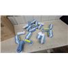 Image 1 : Lot of Giant Tiger Handheld Scrub Brushes with Blue Handles and White Bristles