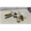 Image 1 : Soapstone Fish Carving, Amethyst Geode, Glass Dolphin Figurine, Fur Souvenir, and More