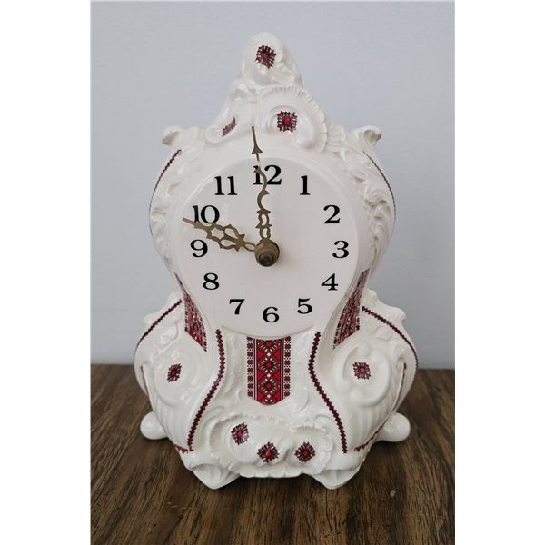 Ornate White Ceramic Mantel Clock with Red Accents
