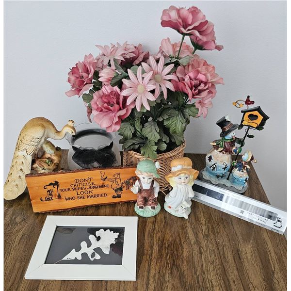 Decorative Items Including Figurines, Floral Arrangement, and Wooden Plaque