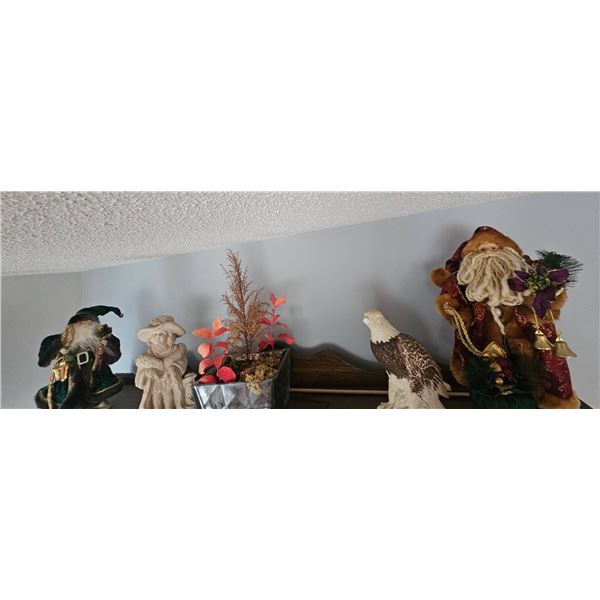 Decorative Lot: Holiday Figurines, Eagle Sculpture, and Potted Faux Plant
