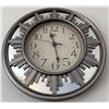 Image 1 : Wall Clock with Sunburst Design and Decorative Table Lamp