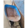 Image 1 : Blue Metal Wheelbarrow with Rust and Signs of Wear