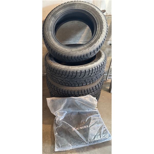 Four Hankook Tires (225/65R17 102T) with Tucson Branded Floor Mats