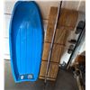 Image 2 : Blue Plastic Toboggan, Wooden Toboggan, and Ski Pole