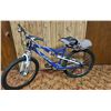 Image 1 : Blue Full-Suspension Bicycle with Seat Storage Attachment