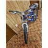 Image 3 : Blue Full-Suspension Bicycle with Seat Storage Attachment