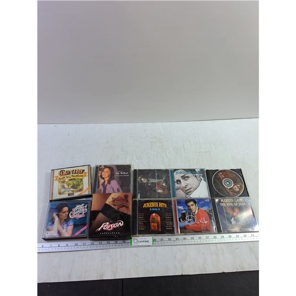 (10) Cd's- Elvis, Johnny Reid, Country,  Ally McBeal, Marvin Gaye,The Poison