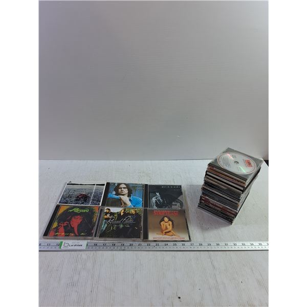 (21) Various CDs- Poison, Striptease, Garth Brooks, James Taylor, Rascal Flatts