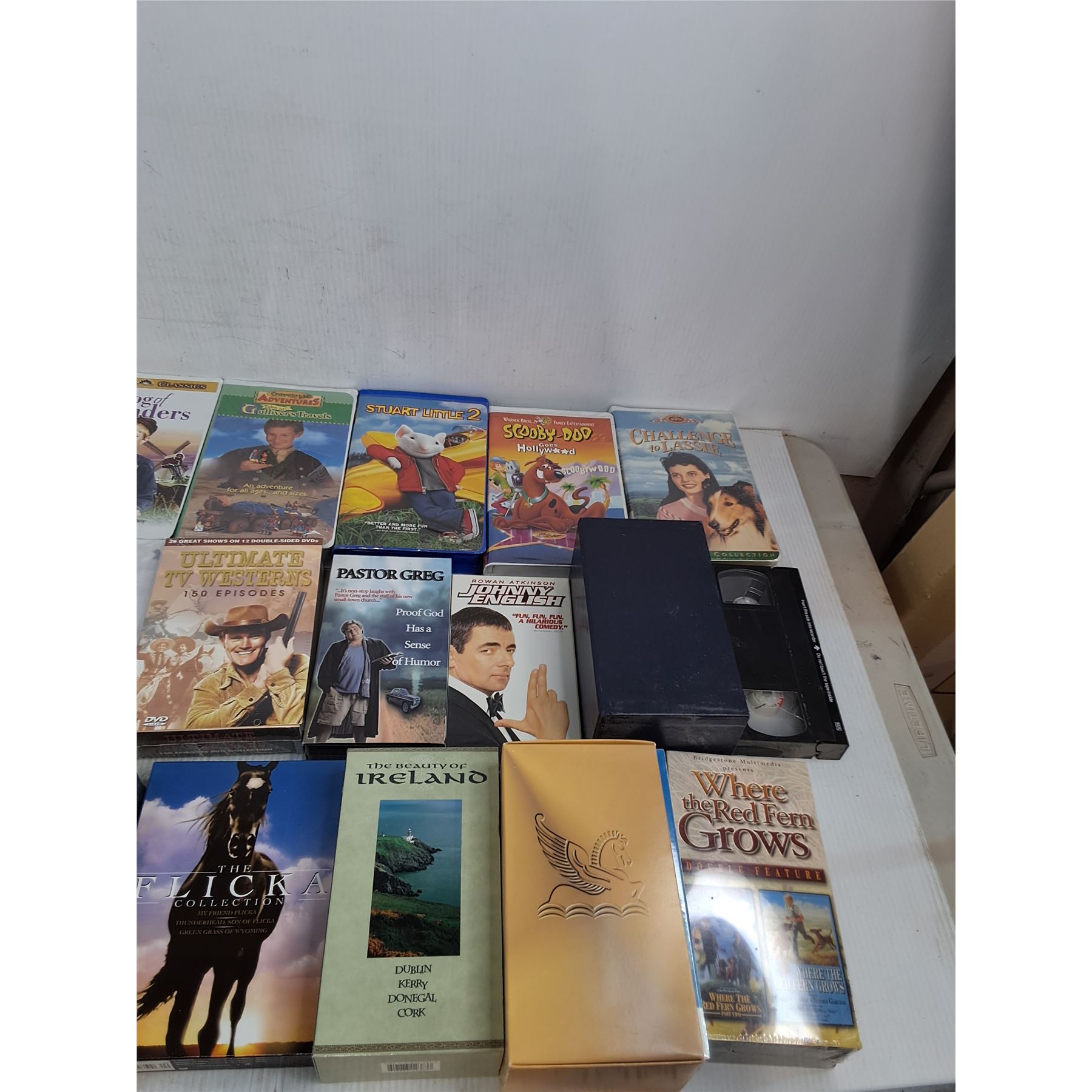 Various VHS and DVD's-Sounder, Bambi, Westerns - Bodnarus Auctioneering