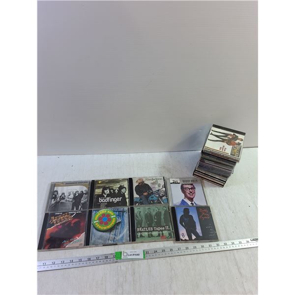 Various CD's- Beatles, Jefferson Airplane, Badfinger, Alan Jackson, Buddy Holly, April Wine